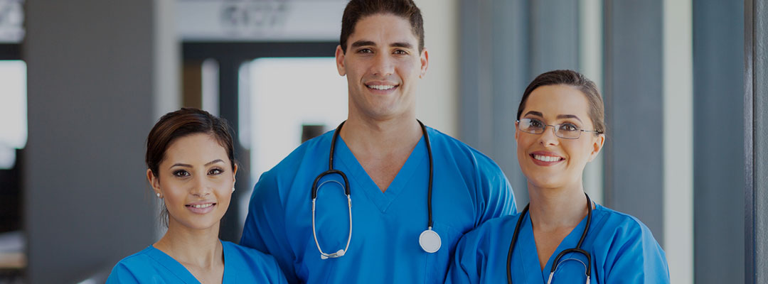 group of hospital workers in scrubs